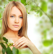 Young woman on blossom background