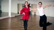 Professional dancers dancing in ballroom