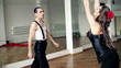 Professional dancers dancing in ballroom, steadicam shot