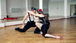 Professional dancers dancing in ballroom