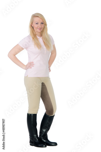 Photo: frau mit reitbekleidung frau mit reitbekleidung
