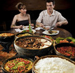 Feijoada - Brazilian meat & bean stew, side dishes & caipirinha