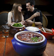 Feijoada - Brazilian meat & bean stew, side dishes & caipirinha