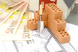 Ziegelsteine mit Plan und Haus
