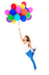 Happy woman holding balloons