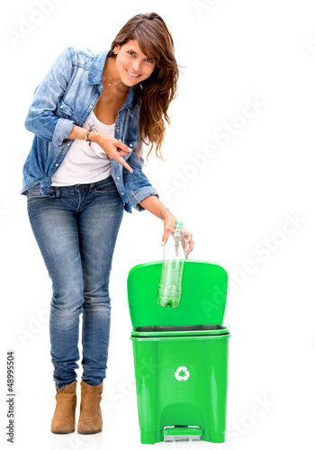 Photo: Woman recycling Woman recycling