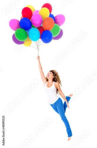 Photo: Happy woman holding balloons Happy woman holding balloons