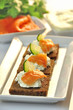 Photo: canapes rye bread with ricotta cheese and smoked salmon canapes rye bread with ricotta cheese and smoked salmon