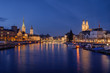 Zurich city center viewed from the river by night