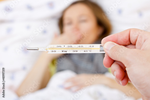 Photo: Sick woman have temperature Sick woman have temperature