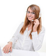 Photo: Smiling attractive woman in call center Smiling attractive woman in call center