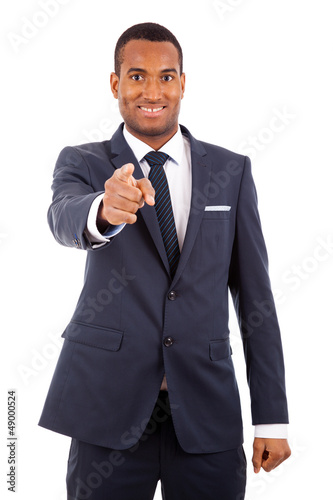 Photo: Portrait of a African American businessman pointing, isolated on Portrait of a African American businessman pointing, isolated on