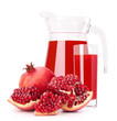 Pomegranate fruit juice in glass pitcher