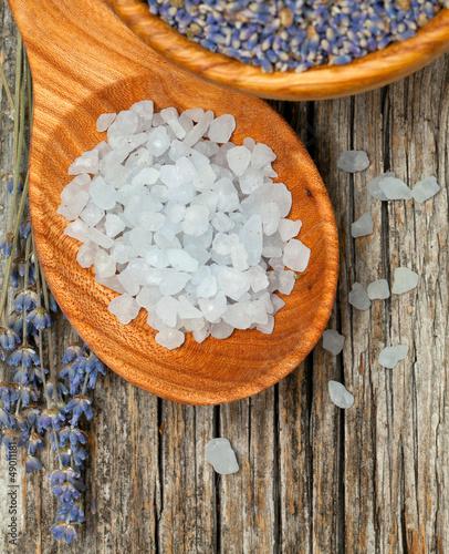 Photo: lavender bath salt on wooden table lavender bath salt on wooden table