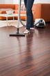 Attractive Female with Vacuum Cleaner