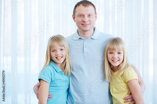 Photo: Father with twins Father with twins