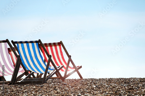 Photo: gestreifte liegestühle am strand gestreifte liegestühle am strand