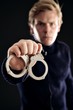 Cop with Handcuffs for Law Offenders