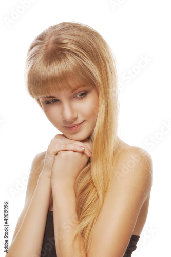 Photo: young woman with bare shoulders dreaming young woman with bare shoulders dreaming