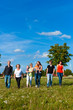 Family and multi-generation - fun on meadow in summer