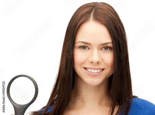 Photo: woman with magnifying glass woman with magnifying glass