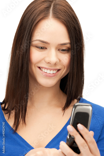 Photo: woman with cell phone woman with cell phone