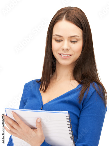 Photo: woman with notepad woman with notepad