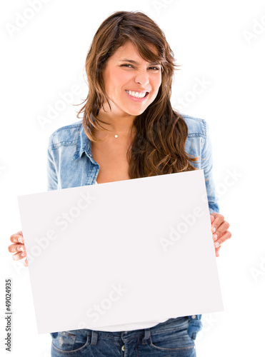 Photo: Woman displaying a banner Woman displaying a banner