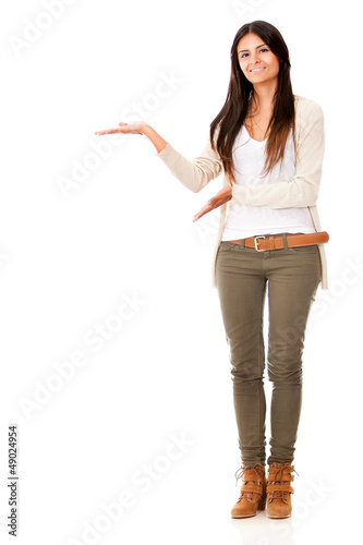 Photo: Woman presenting something Woman presenting something