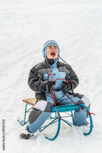 Photo: Boy on sled Boy on sled
