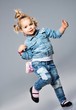 Photo: Funny little girl with small bag Funny little girl with small bag