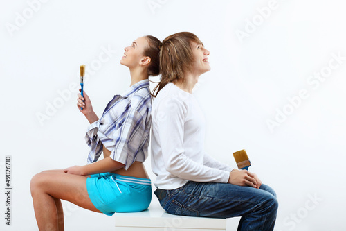 Photo: Couple with paint brushes Couple with paint brushes