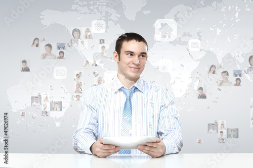Photo: Business person and finance related background Business person and finance related background