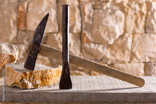 Photo: Hammer tools of stonecutter masonry work Hammer tools of stonecutter masonry work