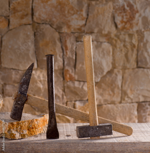 Photo: Hammer tools of stonecutter masonry work Hammer tools of stonecutter masonry work