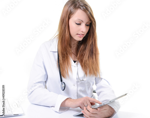 Photo: female student doctor working with digital tablet female student doctor working with digital tablet