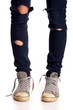 Vintage looking sneakers and ripped jeans