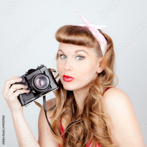 Photo: retro woman with camera retro woman with camera