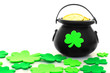 St Patrick's Day pot of gold with scattered shamrocks