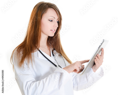 Photo: female nurse working with digital tablet female nurse working with digital tablet