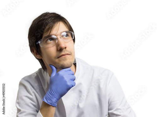Photo: Ein nachdenklicher Wissenschaftler denkt nach Ein nachdenklicher Wissenschaftler denkt nach