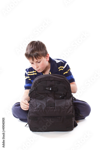 Photo: schoolboy with backpack schoolboy with backpack