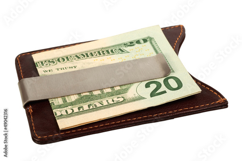 Photo: Dollars in money clip. Dollars in money clip.