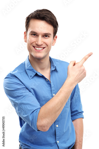 Photo: Young man pointing Young man pointing