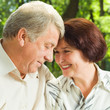Senior happy couple embracing, outdoors