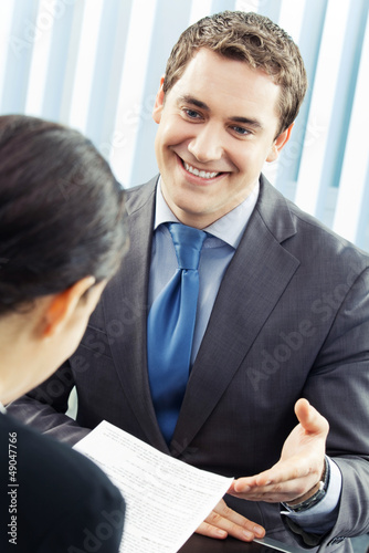 Photo: Businesspeople, or businessman and client Businesspeople, or businessman and client
