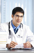 Writing doctor at office