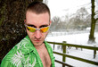 Photo: Young good looking male outdoors in snow Young good looking male outdoors in snow