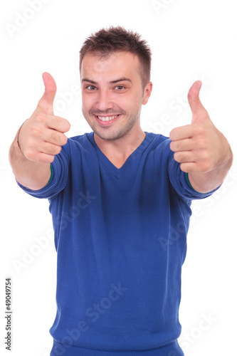 Photo: young man with thumbs up young man with thumbs up