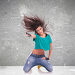 woman dancer standing onher knees
